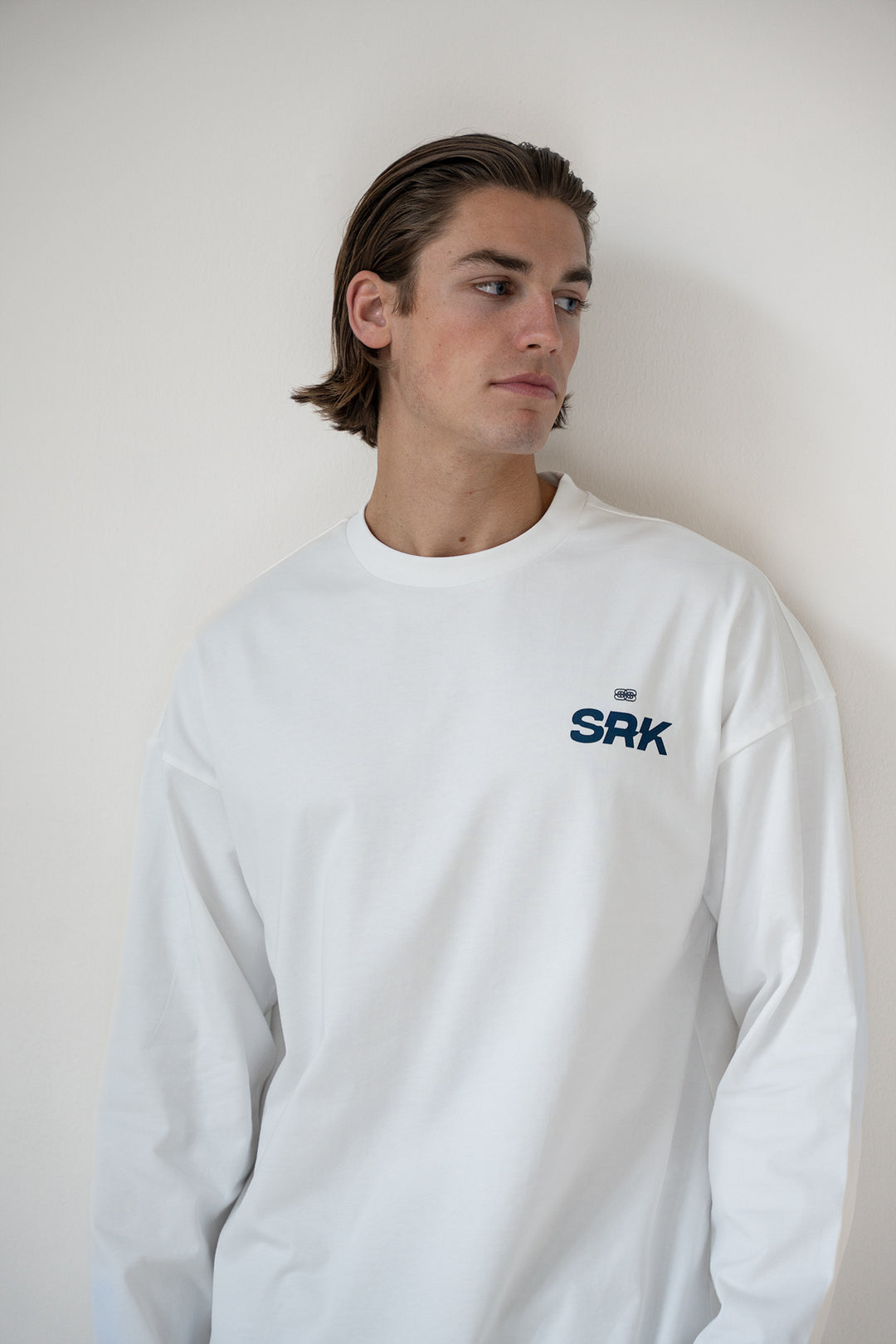 'THE NEW RICH' Longsleeve tee ‘Off white & Navy’